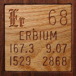 Wooden tile representing the elementErbium