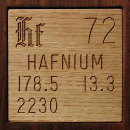 Wooden tile representing the elementHafnium