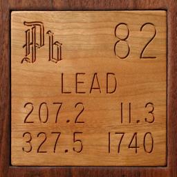 Wooden tile representing the elementLead