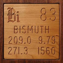 Wooden tile representing the elementBismuth