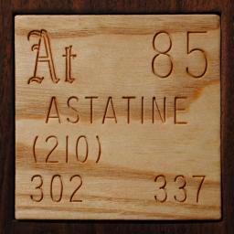 Wooden tile representing the elementAstatine