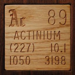Wooden tile representing the elementActinium