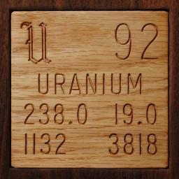 Wooden tile representing the elementUranium