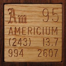 Wooden tile representing the elementAmericium